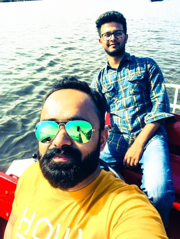 None other than myself along with a friend enjoying the boat ride